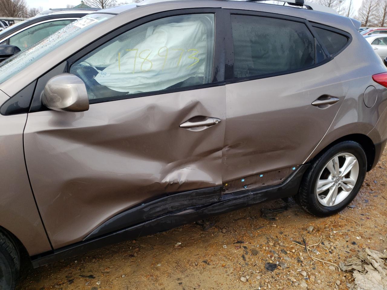 Photo 9 from auction – 2011 HYUNDAI TUCSON GLS with VIN KM8JU3AC1BU225022