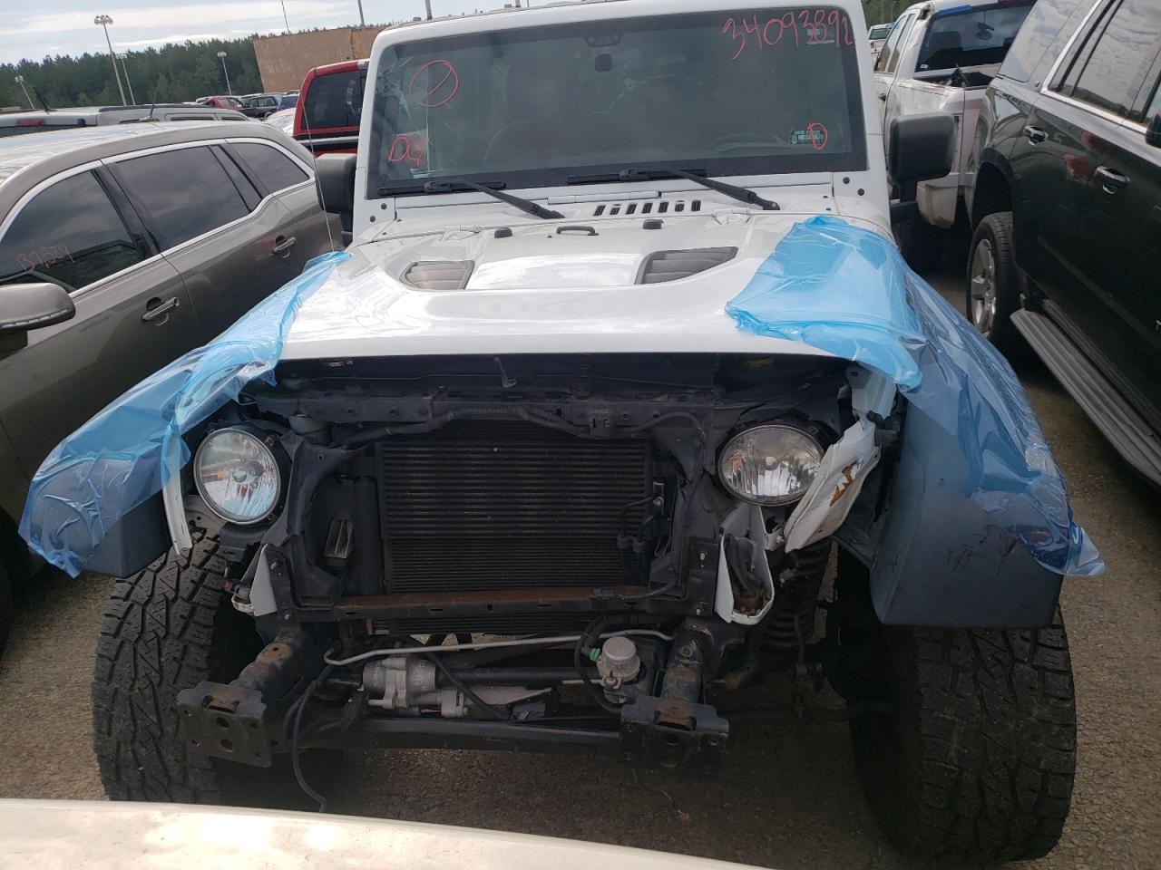 Photo 9 from auction – 2013 JEEP WRANGLER U with VIN 1C4HJWFG9DL664518