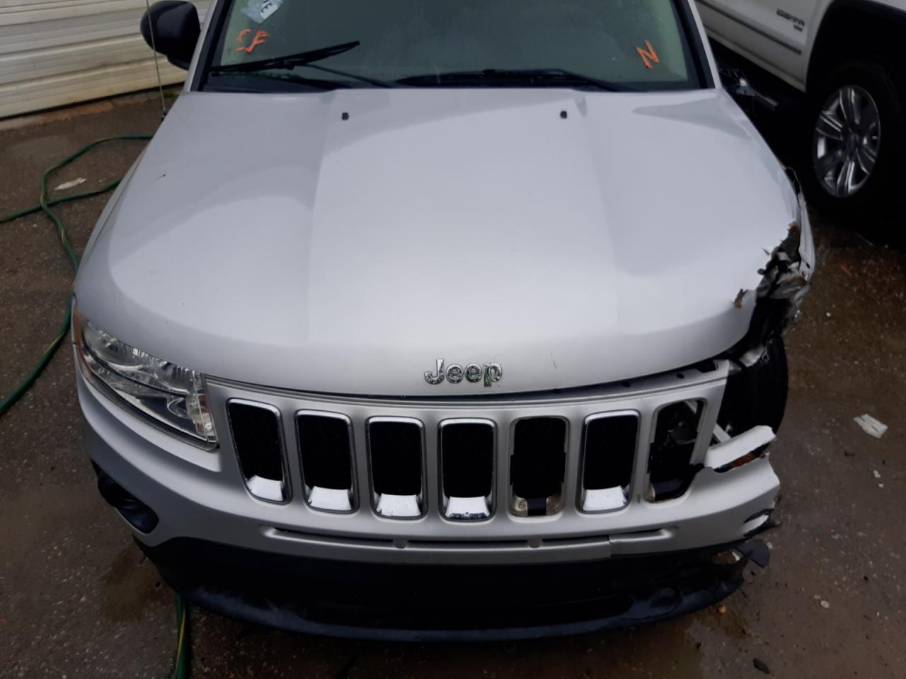 Photo 7 from auction – 2011 JEEP COMPASS SP with VIN 1J4NT1FA4BD180981