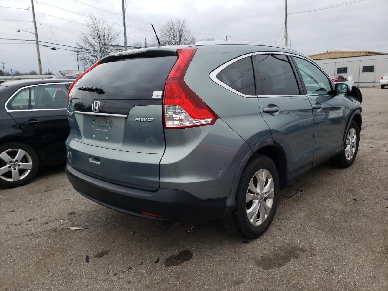Photo 4 from auction – 2012 HONDA CR-V EXL with VIN 5J6RM4H7XCL055072