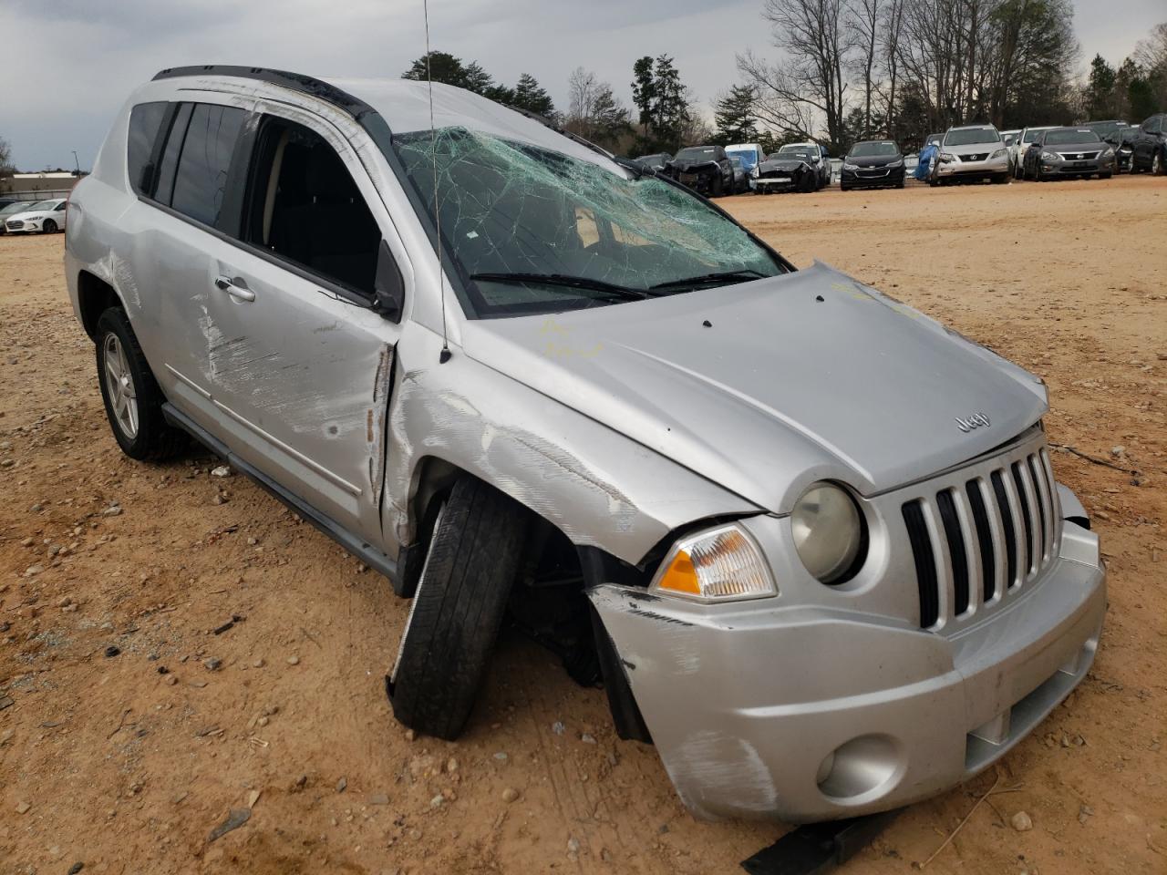 JEEP COMPASS SP 2010 with VIN 1J4NT4FB3AD593824 - Photo from auction