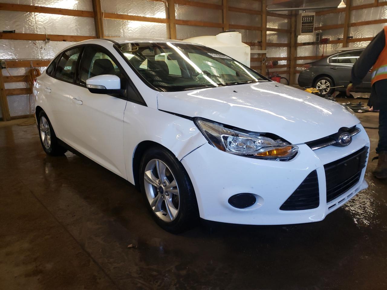 FORD FOCUS SE 2014 with VIN 1FADP3F23EL109748 - Photo from auction