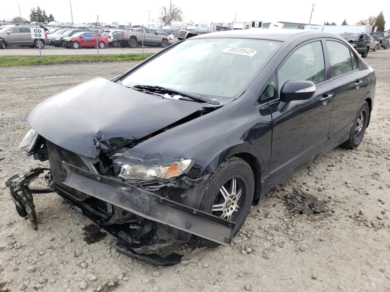 Photo 2 from auction – 2009 HONDA CIVIC HYBR with VIN JHMFA36229S018792