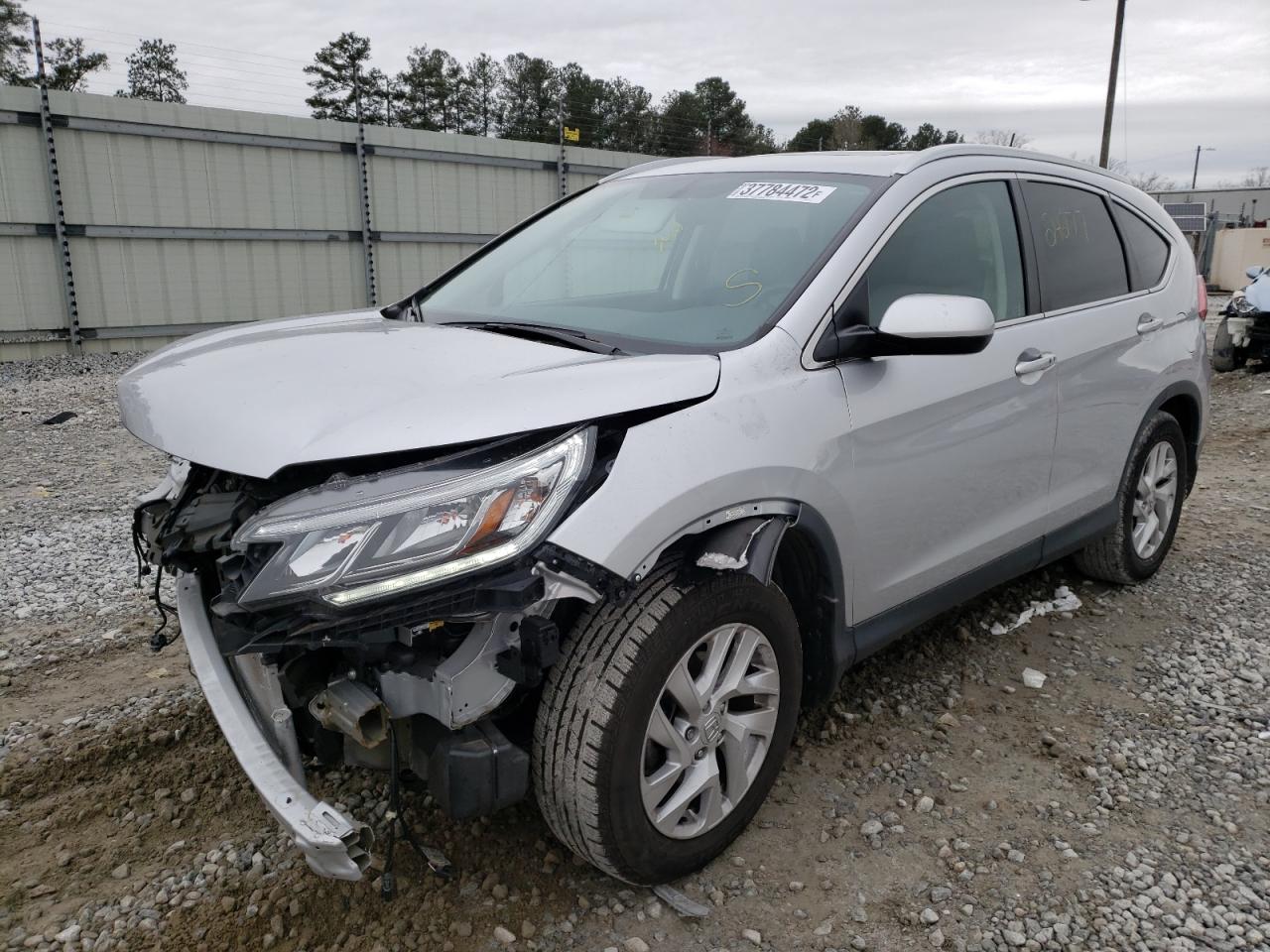 Photo 2 from auction – 2015 HONDA CR-V EXL with VIN 2HKRM3H70FH521245