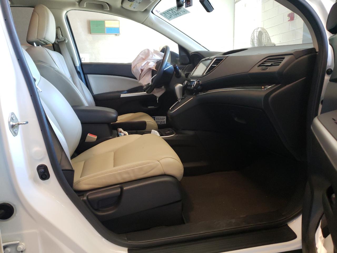 Photo 5 from auction – 2016 HONDA CR-V EXL with VIN 5J6RM4H79GL070507