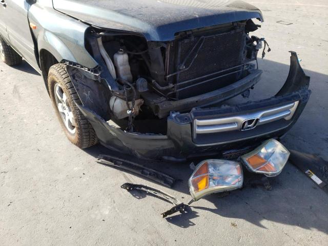 Photo 9 from auction – 2006 HONDA PILOT EX with VIN 2HKYF18406H551801