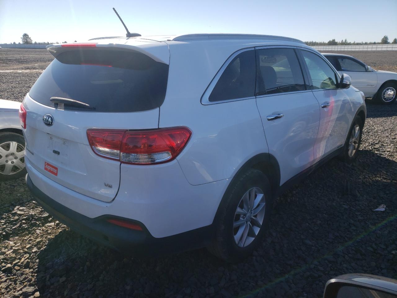Photo 4 from auction – 2016 KIA SORENTO LX with VIN 5XYPGDA52GG135402