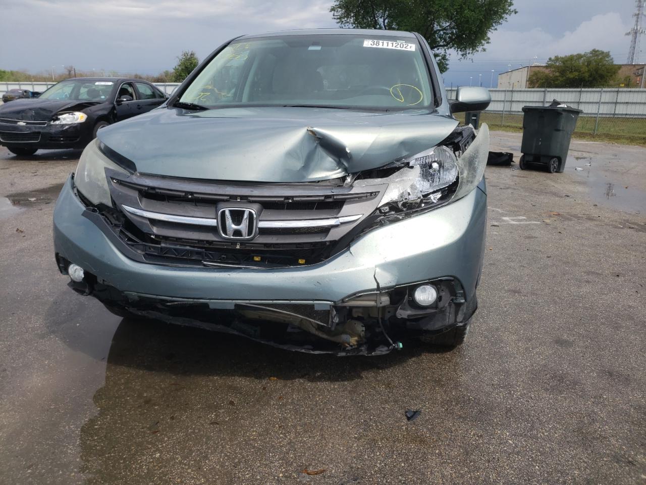 Photo 9 from auction – 2012 HONDA CR-V EX with VIN 5J6RM3H56CL040089