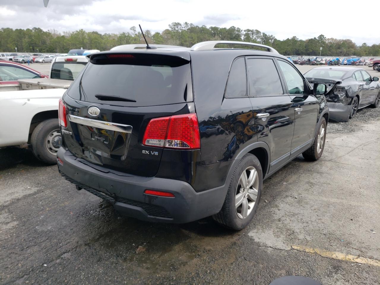 Photo 4 from auction – 2012 KIA SORENTO EX with VIN 5XYKU4A26CG253391