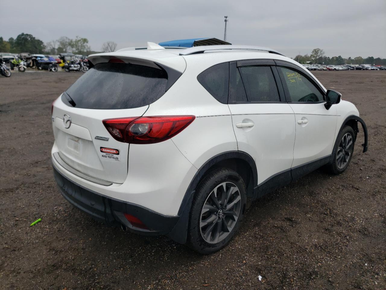 Photo 4 from auction – 2016 MAZDA CX-5 GT with VIN JM3KE2DY4G0796162