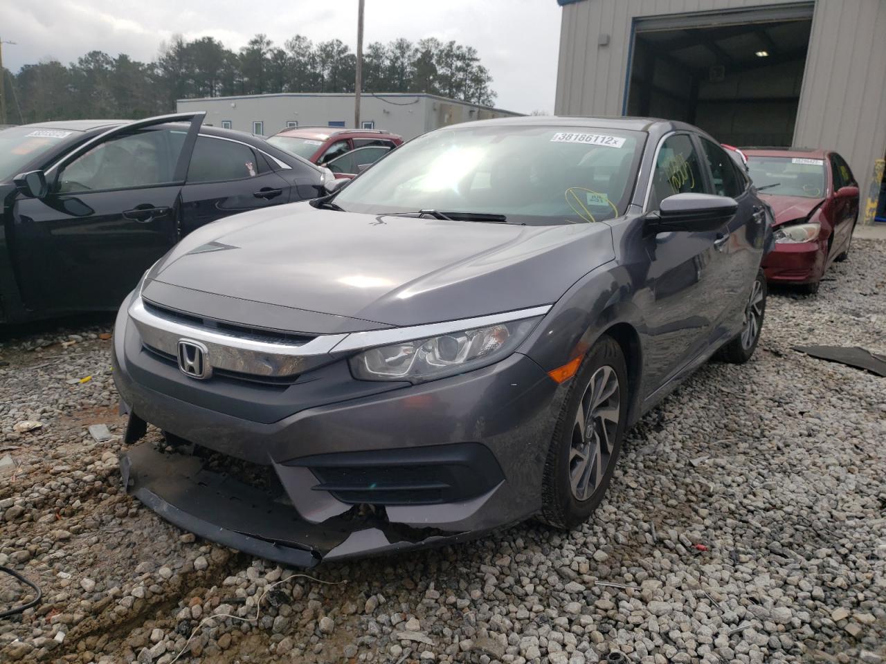 Photo 2 from auction – 2016 HONDA CIVIC EX with VIN 19XFC2F72GE056217