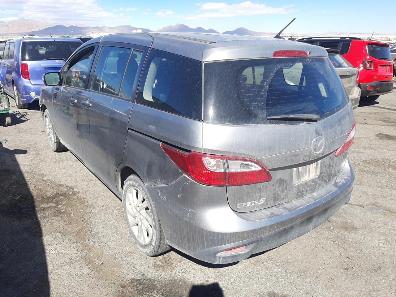 Photo 3 from auction – 2014 MAZDA 5 SPORT with VIN JM1CW2BL9E0177572