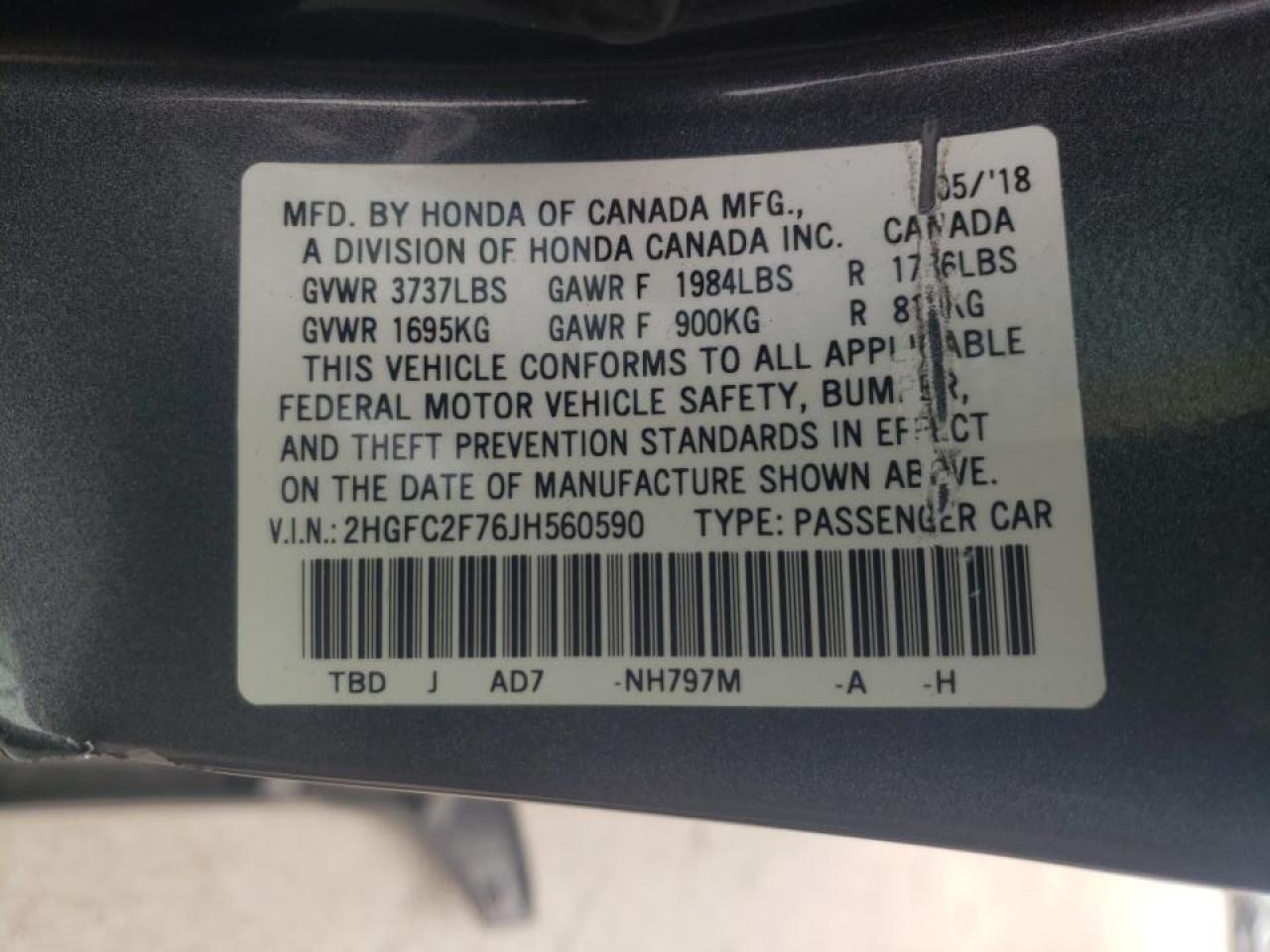 Photo 10 from auction – 2018 HONDA CIVIC EX with VIN 2HGFC2F76JH560590