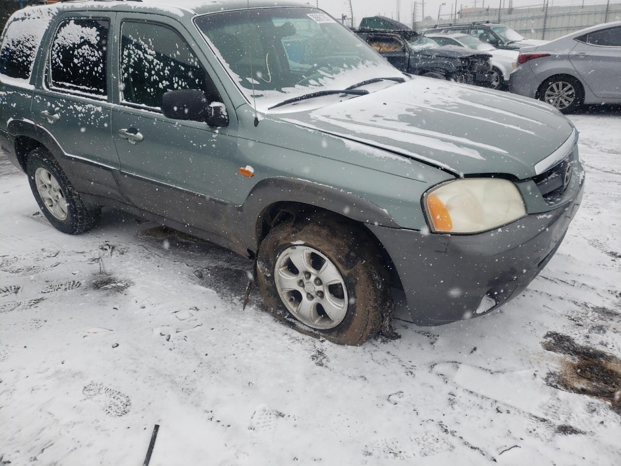 Photo 9 from auction – 2004 MAZDA TRIBUTE LX with VIN 4F2YZ94174KM27430