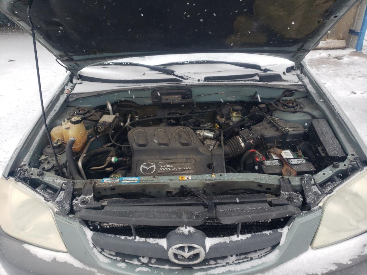 Photo 7 from auction – 2004 MAZDA TRIBUTE LX with VIN 4F2YZ94174KM27430