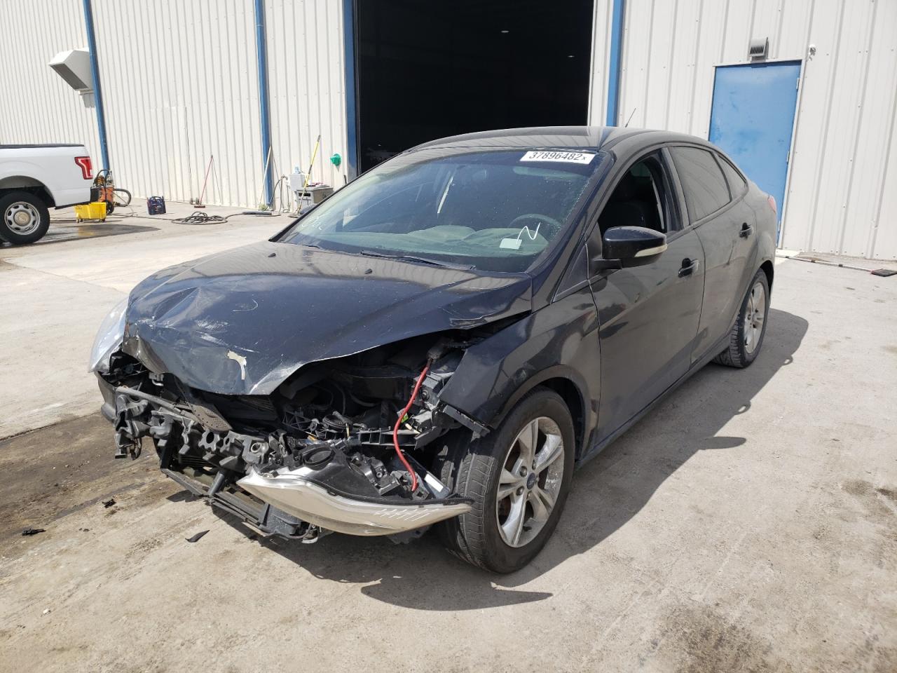 Photo 2 from auction – 2014 FORD FOCUS SE with VIN 1FADP3F29EL159909