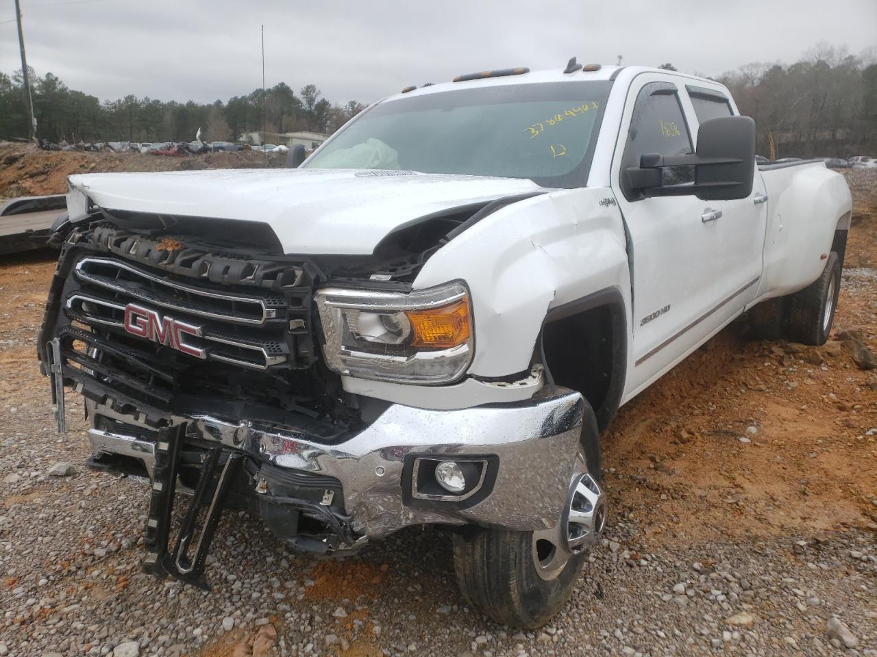 Photo 2 from auction – 2015 GMC SIERRA K35 with VIN 1GT423C83FF128625