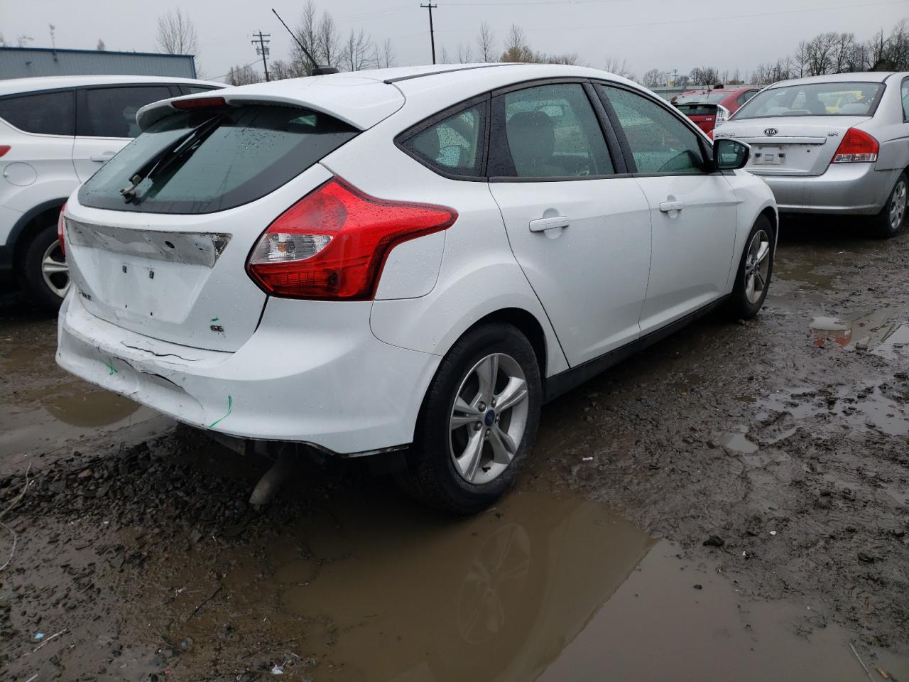 Foto 4 de la subasta – 2013 FORD FOCUS SE con VIN 1FADP3K20DL251978