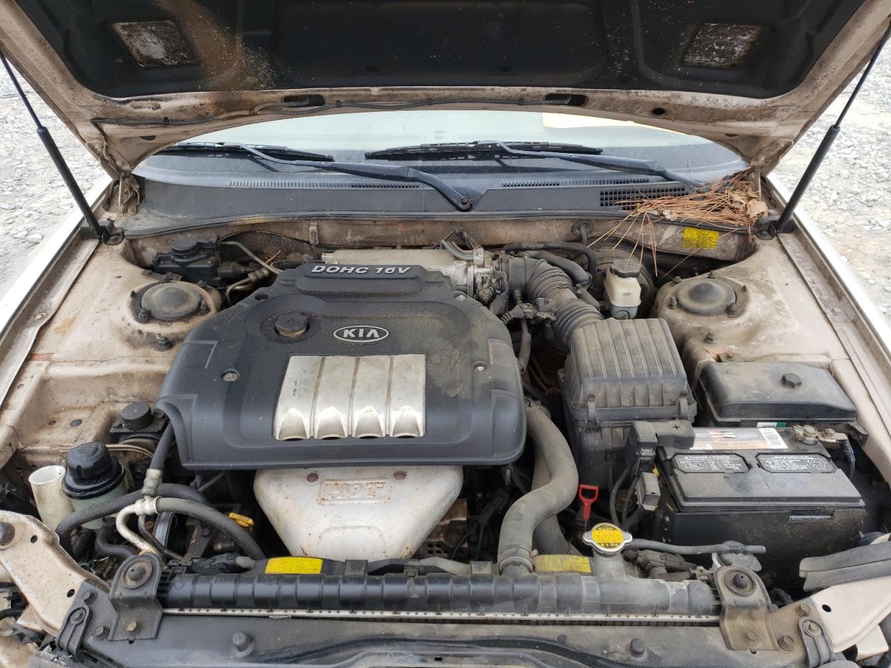 Photo 7 from auction – 2004 KIA OPTIMA LX with VIN KNAGD126245321361