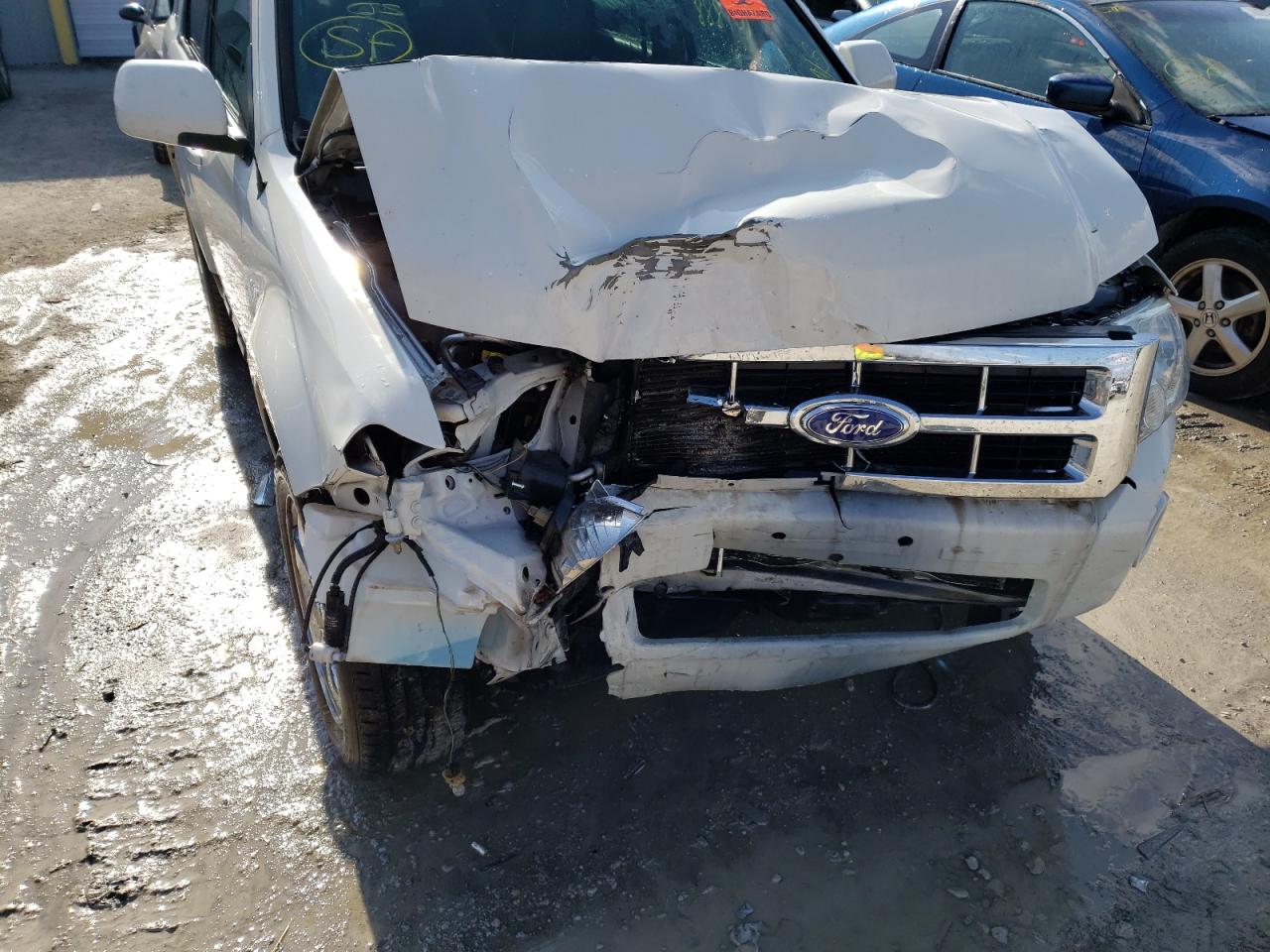 Photo 9 from auction – 2011 FORD ESCAPE LIM with VIN 1FMCU0EG5BKC09406