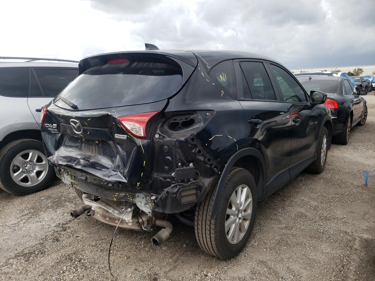 Photo 4 from auction – 2014 MAZDA CX-5 TOURI with VIN JM3KE2CY3E0392025