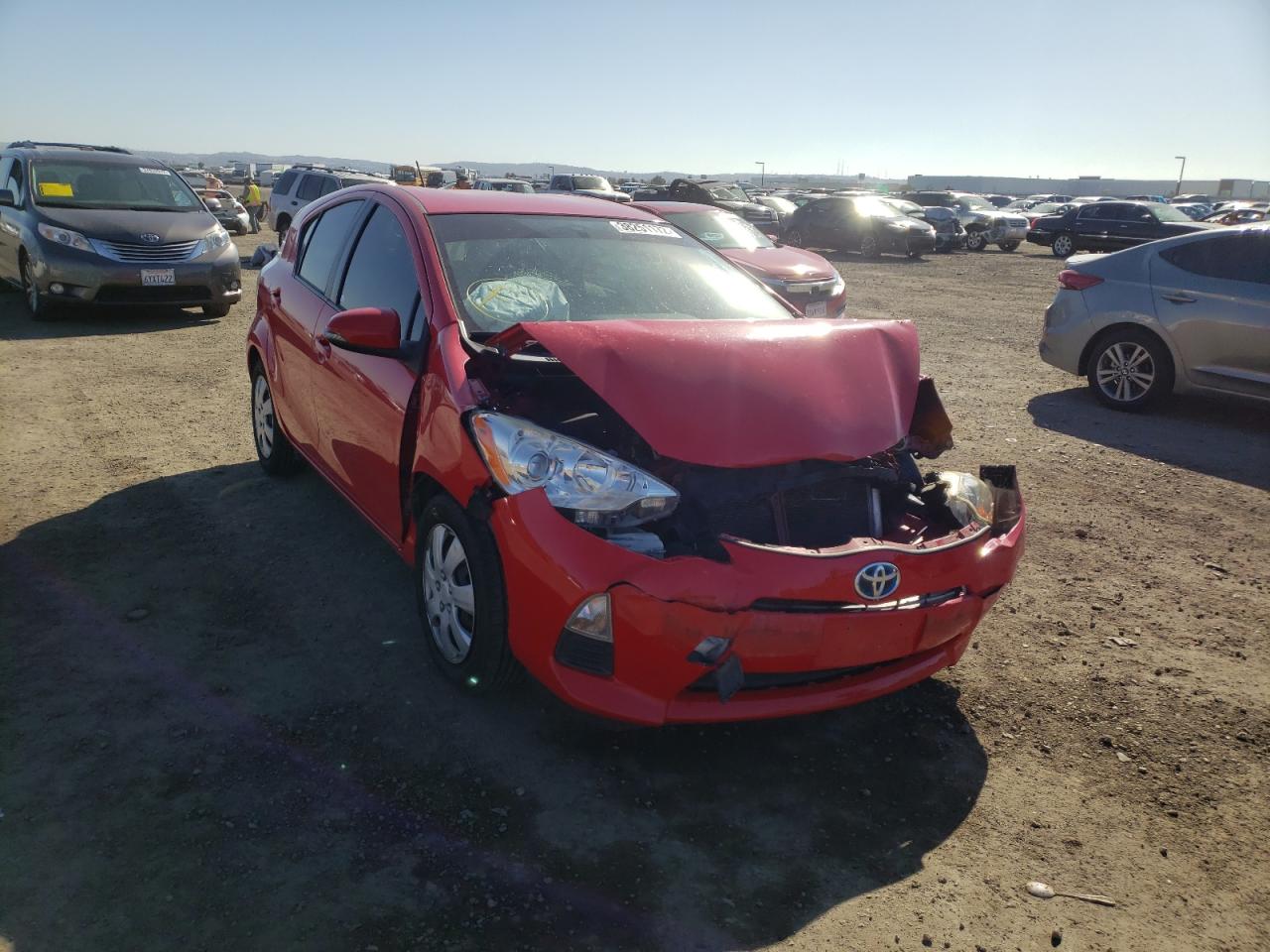 TOYOTA PRIUS C 2014 with VIN JTDKDTB37E1063362 - Photo from auction