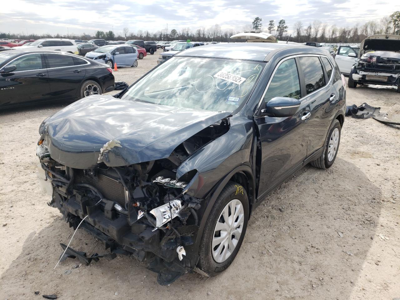 Photo 2 from auction – 2014 NISSAN ROGUE S with VIN 5N1AT2ML2EC860298