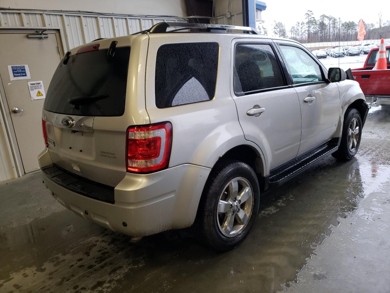 Photo 4 from auction – 2010 FORD ESCAPE LIM with VIN 1FMCU0E72AKD43000