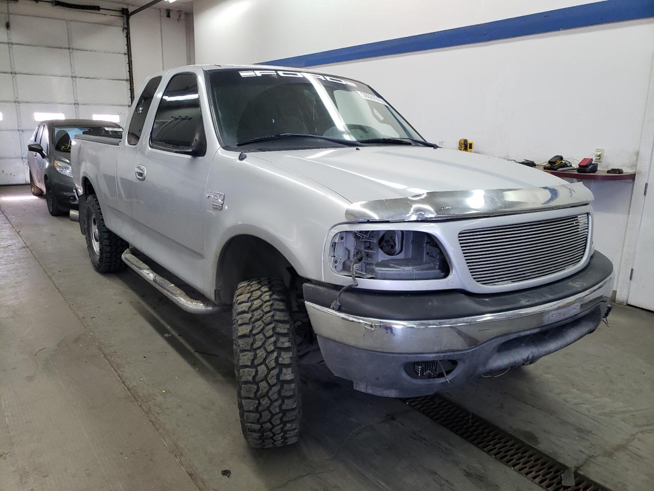 FORD F150 2000 with VIN 1FTRX17L7YNC29833 - Photo from auction