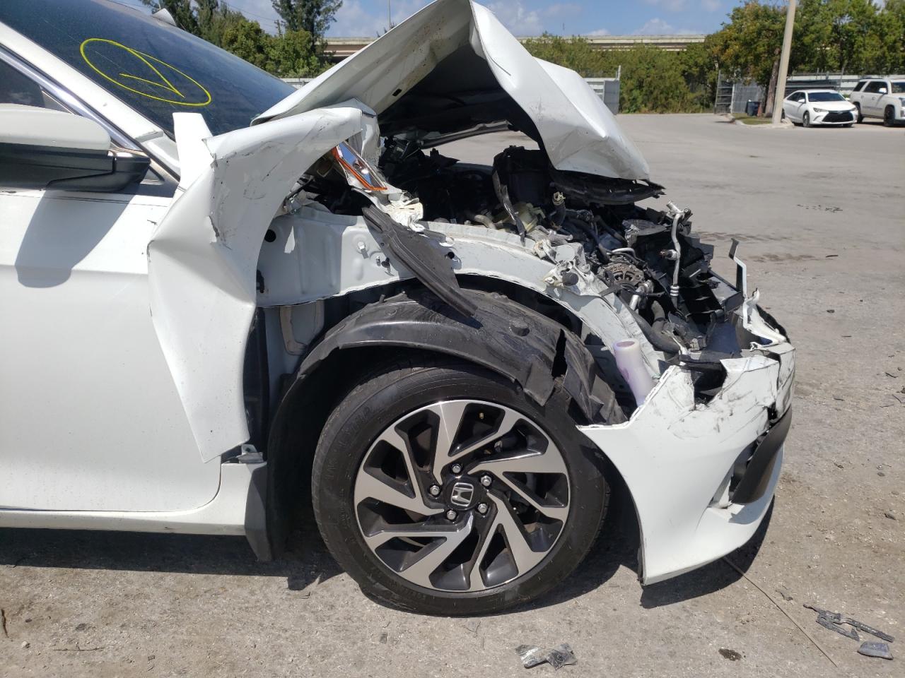 Photo 9 from auction – 2017 HONDA CIVIC LX with VIN 2HGFC4B59HH301229