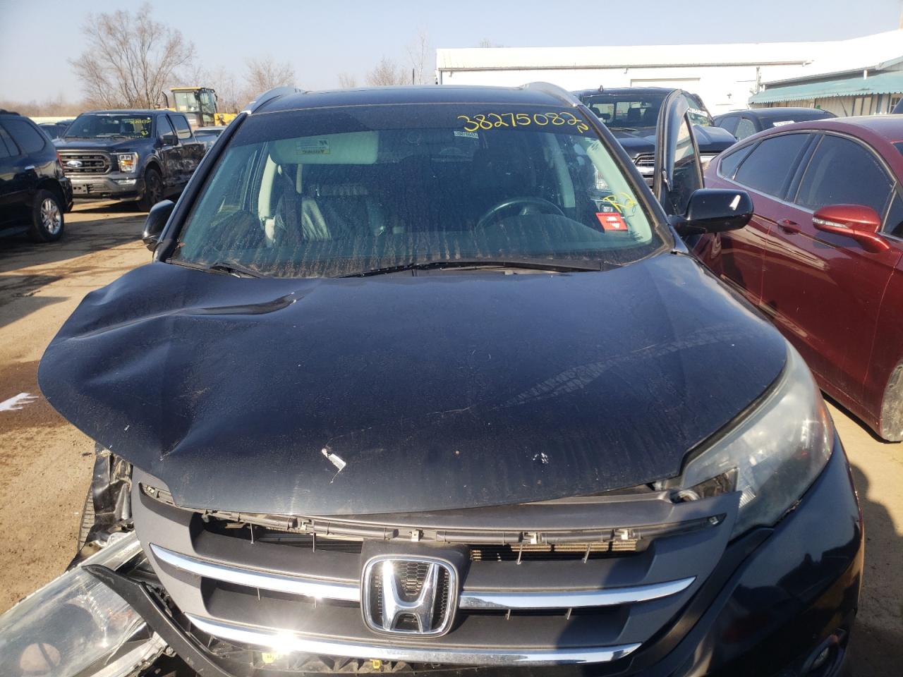Photo 7 from auction – 2012 HONDA CRV with VIN 5J6RM4H73CL021281