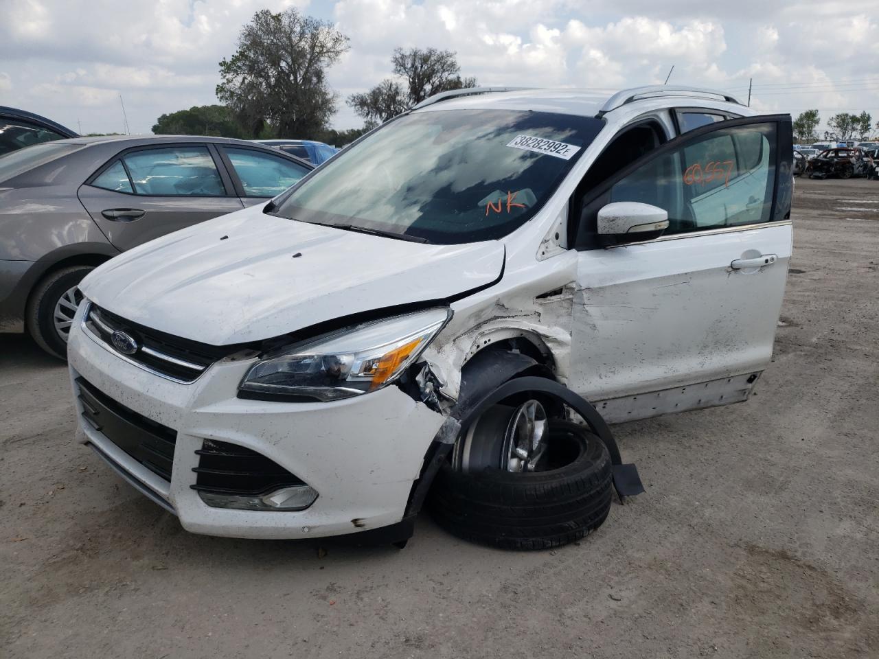 Photo 2 from auction – 2015 FORD ESCAPE TIT with VIN 1FMCU0JX6FUC23282