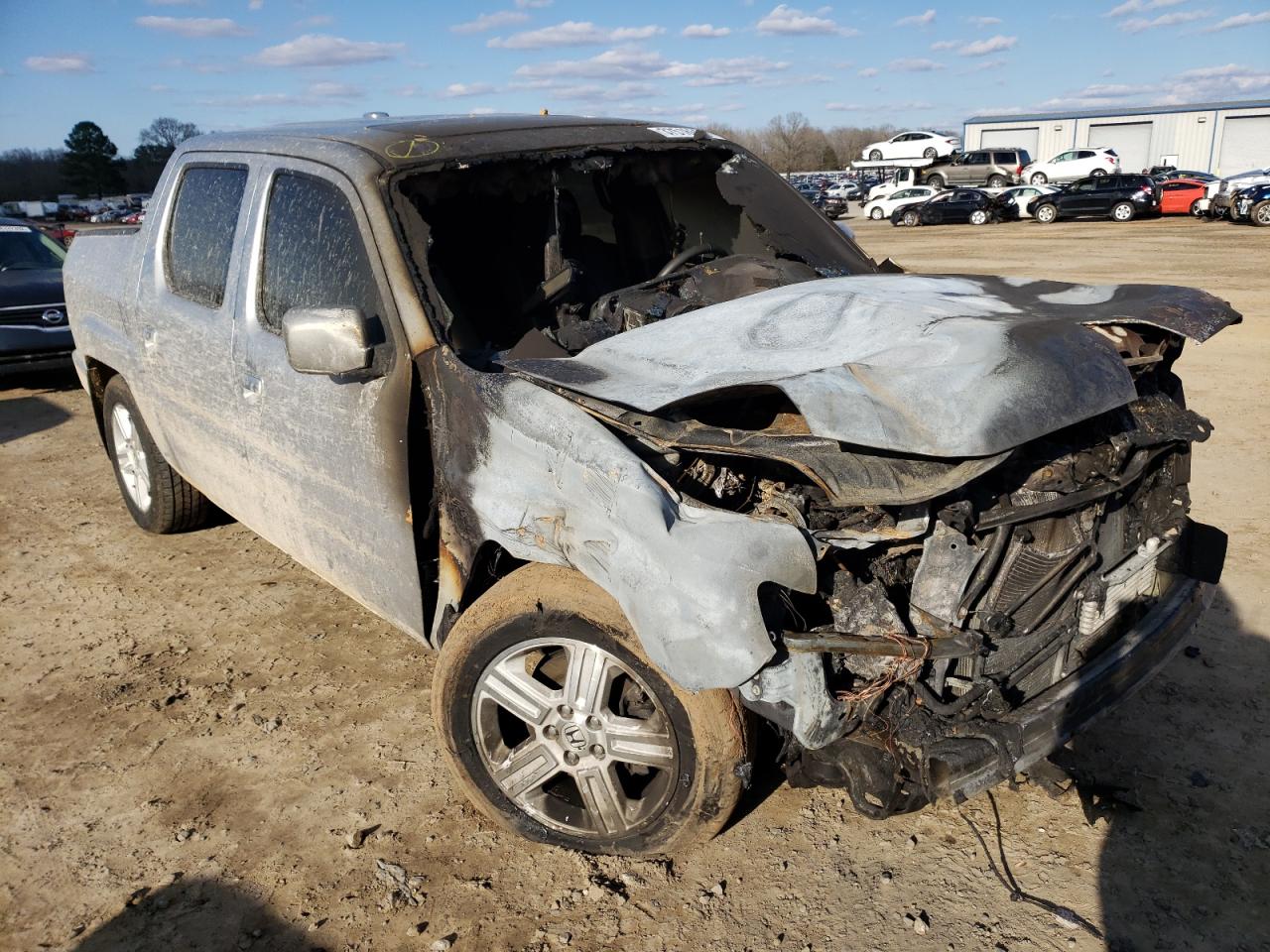 HONDA RIDGELINE 2013 with VIN 5FPYK1F54DB010373 - Photo from auction