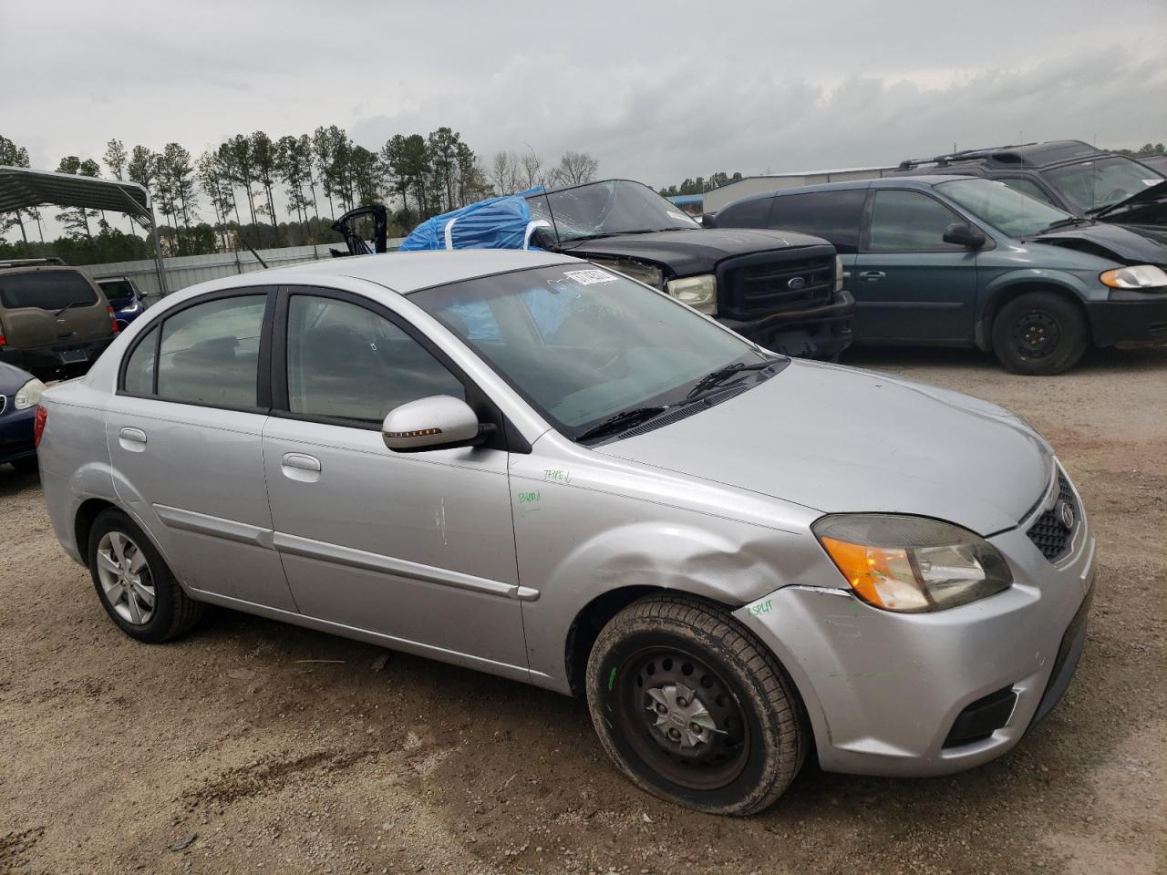 KIA RIO BASE 2011 with VIN KNADH4A35B6914588 - Photo from auction