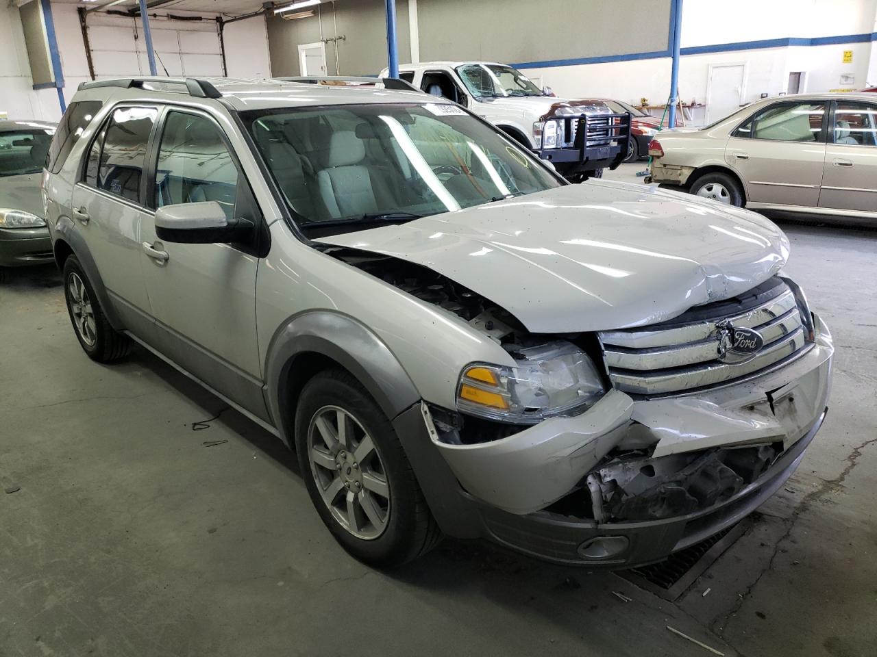 FORD TAURUS X S 2008 with VIN 1FMDK05W78GA19734 - Photo from auction