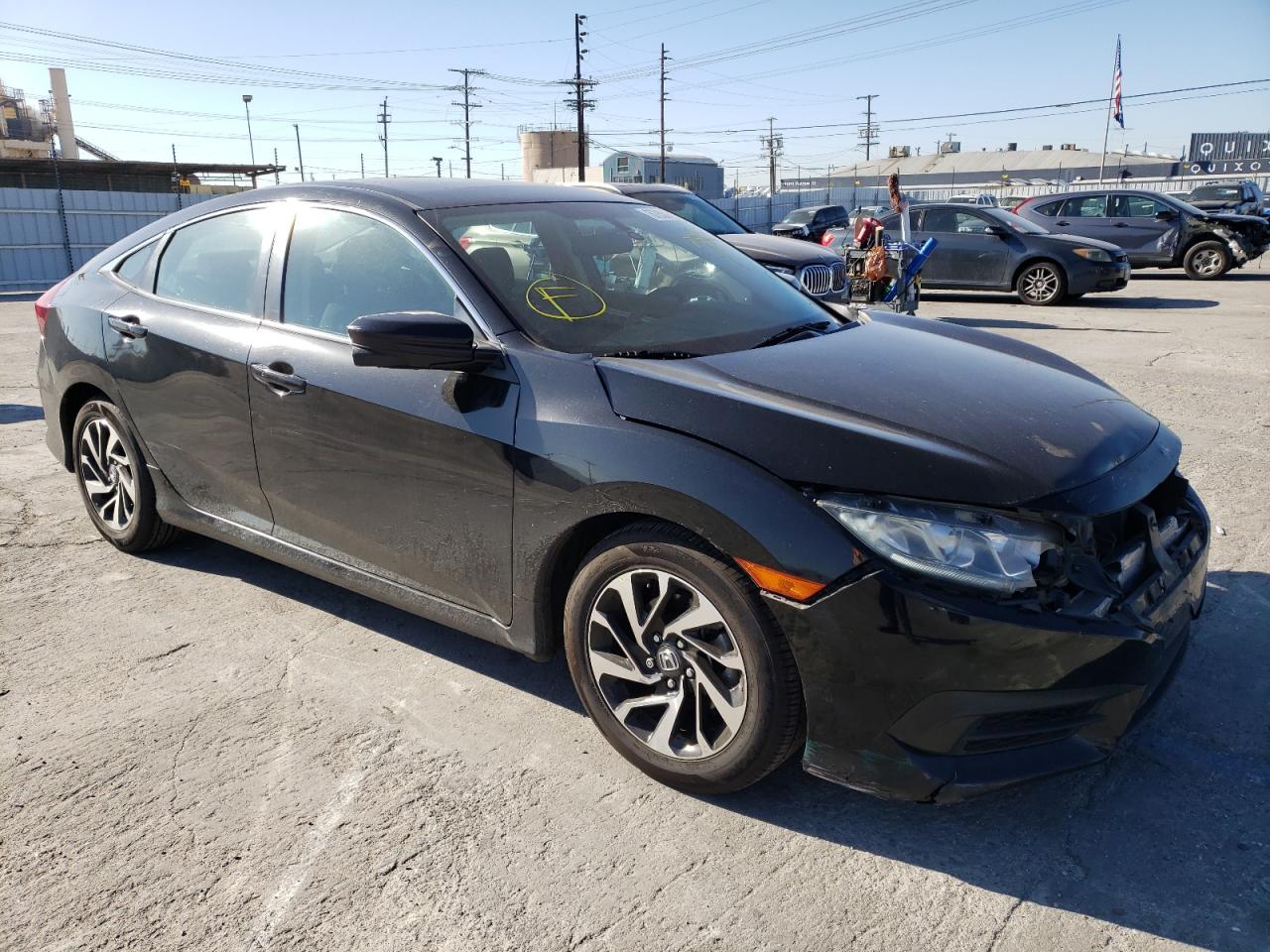 HONDA CIVIC EX 2016 with VIN 2HGFC2F7XGH573626 - Photo from auction