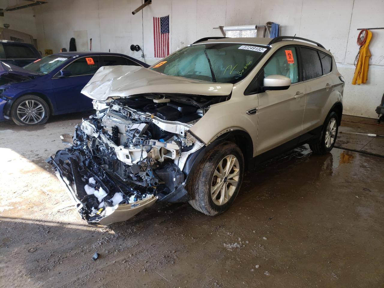 Photo 2 from auction – 2018 FORD ESCAPE SE with VIN 1FMCU9GD4JUA96719