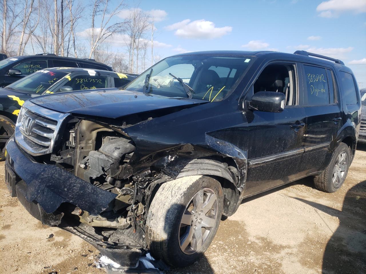 Photo 2 from auction – 2014 HONDA PILOT TOUR with VIN 5FNYF4H98EB019710