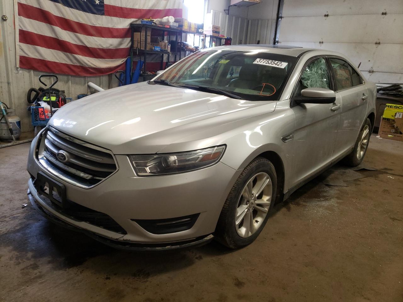 Photo 2 from auction – 2013 FORD TAURUS SEL with VIN 1FAHP2E84DG199338
