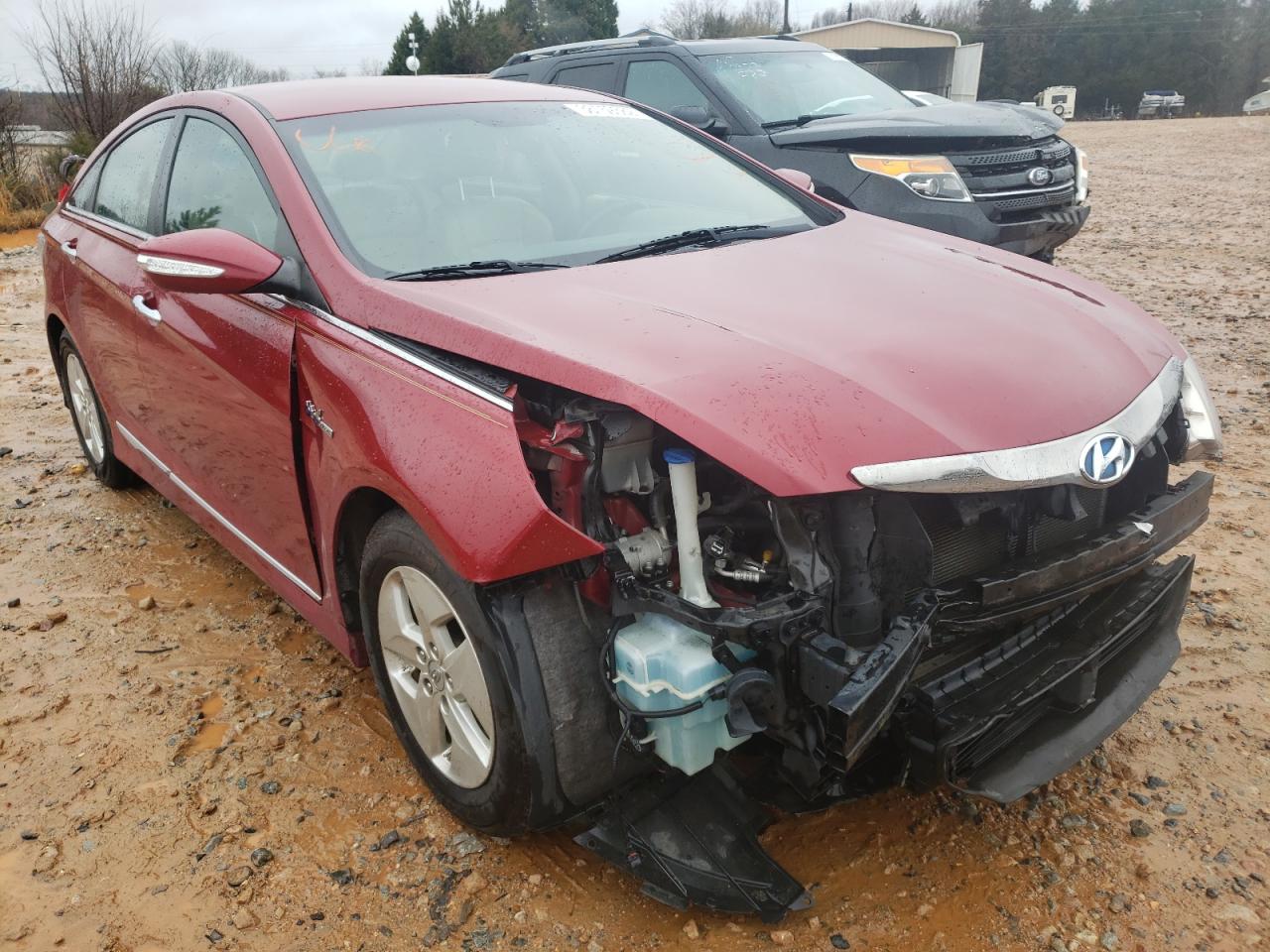 HYUNDAI SONATA HYB 2012 with VIN KMHEC4A42CA020671 - Photo from auction