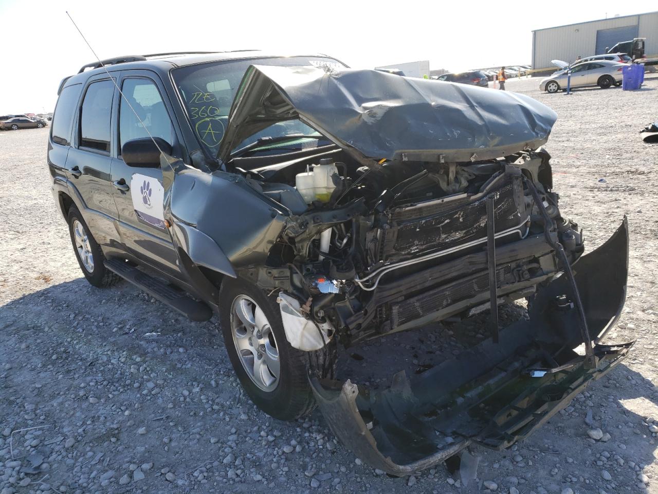 MAZDA TRIBUTE LX 2002 with VIN 4F2CU09122KM30097 - Photo from auction