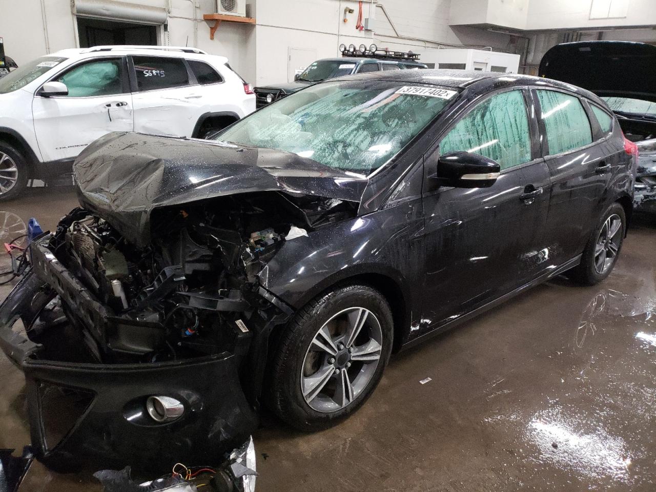 Photo 2 from auction – 2014 FORD FOCUS SE with VIN 1FADP3K26EL143768