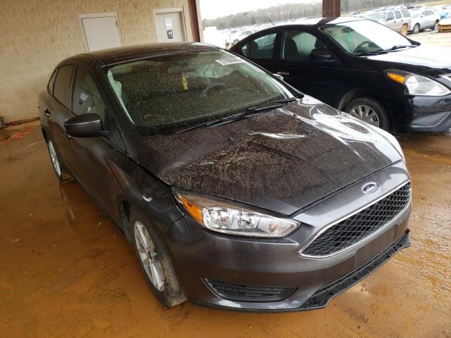 FORD FOCUS SE 2018 with VIN 1FADP3F25JL201387 - Photo from auction