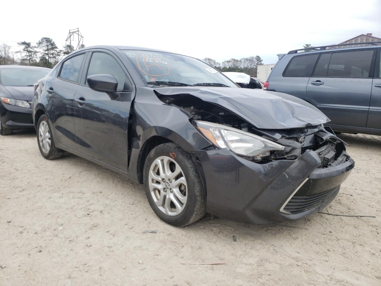 SCION IA 2016 with VIN 3MYDLBZV9GY136096 - Photo from auction