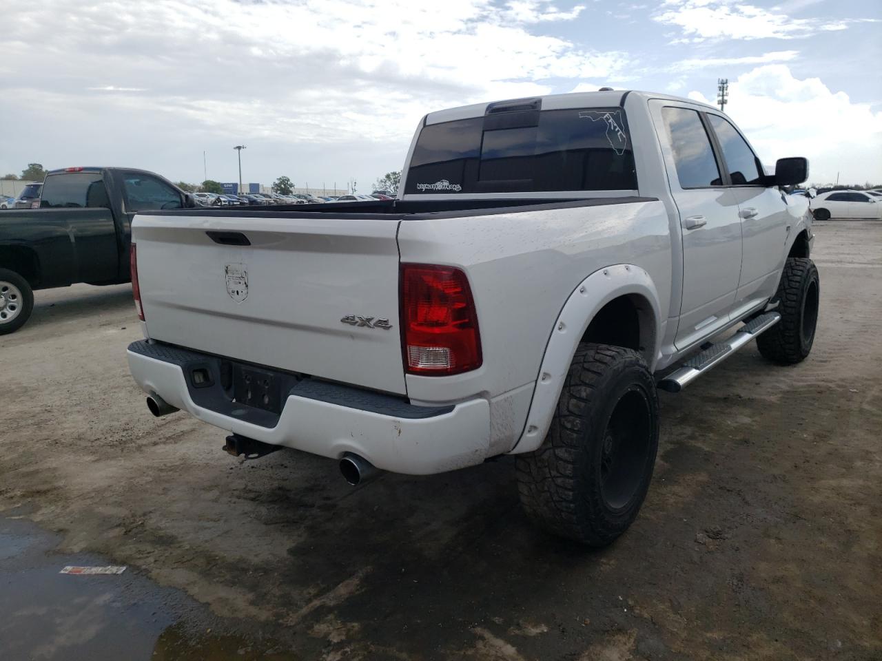 Photo 4 from auction – 2011 DODGE RAM 1500 with VIN 1D7RV1CT7BS572572