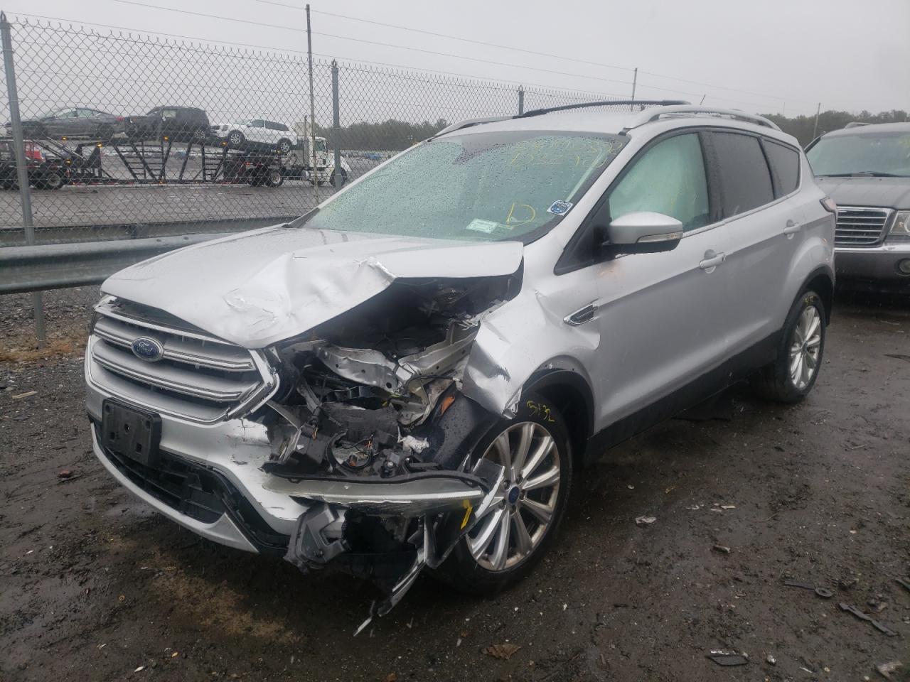 Photo 2 from auction – 2017 FORD ESCAPE TIT with VIN 1FMCU9J94HUD32901