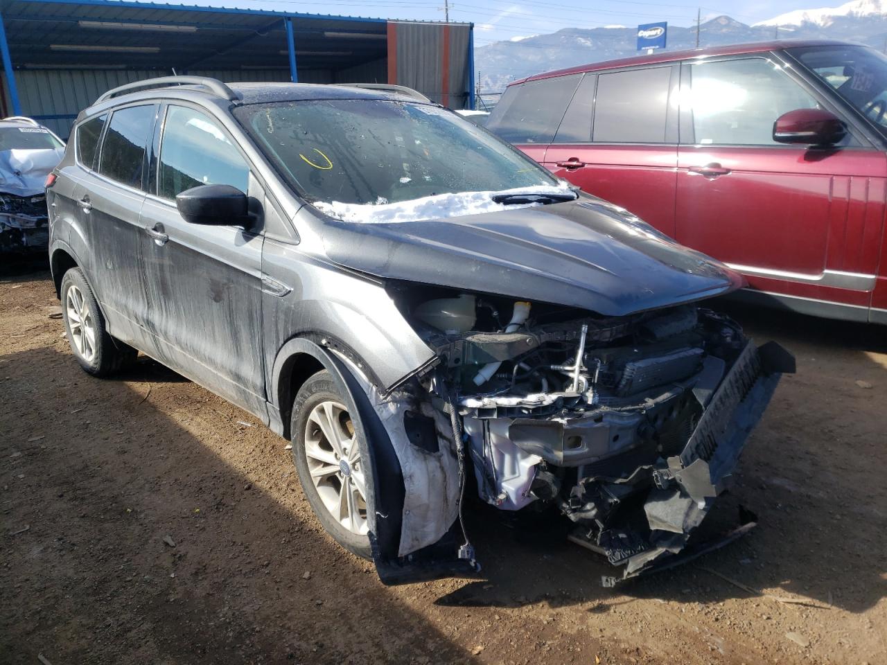FORD ESCAPE SEL 2018 with VIN 1FMCU9HD9JUB31169 - Photo from auction