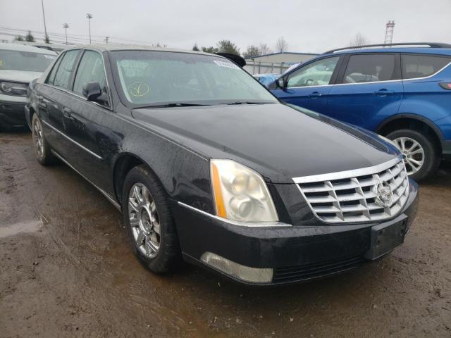 CADILLAC DTS 2011 with VIN 1G6KA5E65BU102344 - Photo from auction