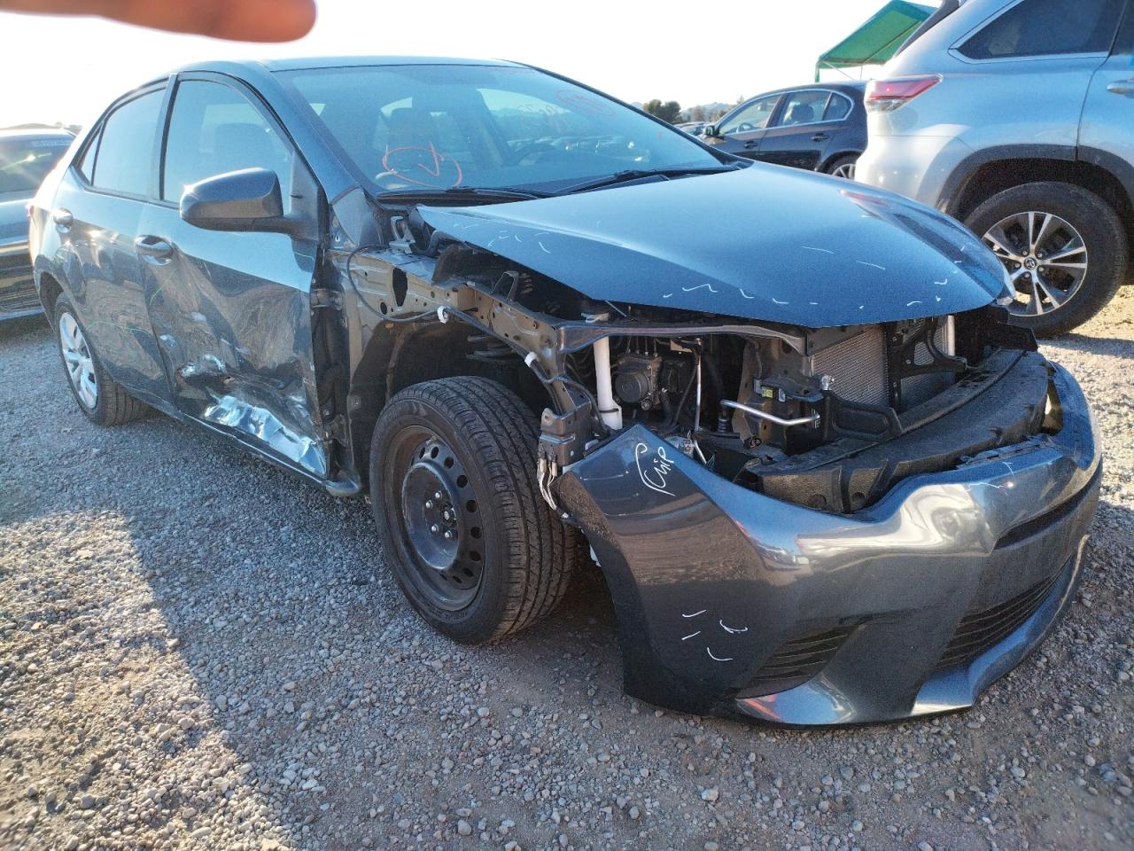 TOYOTA COROLLA L 2014 con VIN 5YFBURHEXEP032646 - Foto de la subasta