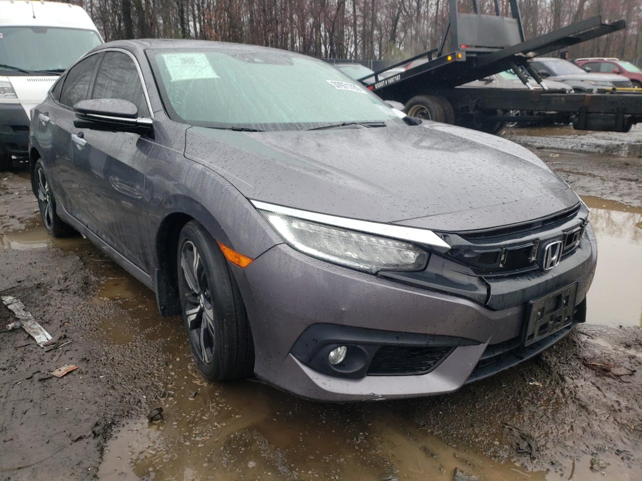 HONDA CIVIC TOUR 2016 with VIN 19XFC1F98GE223899 - Photo from auction